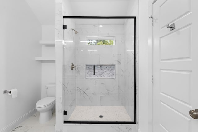 bathroom with toilet and walk in shower