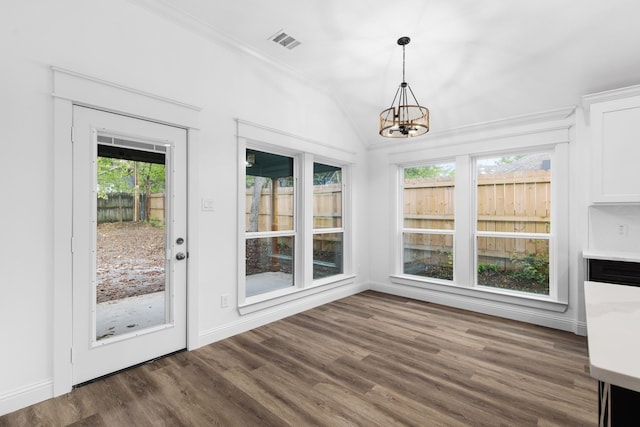 unfurnished sunroom with an inviting chandelier and lofted ceiling