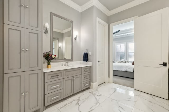 bathroom with vanity and ornamental molding