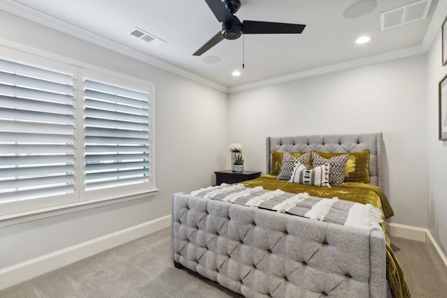 carpeted bedroom featuring ceiling fan and ornamental molding