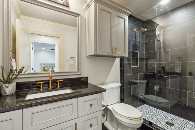 bathroom featuring vanity, toilet, walk in shower, and ornamental molding