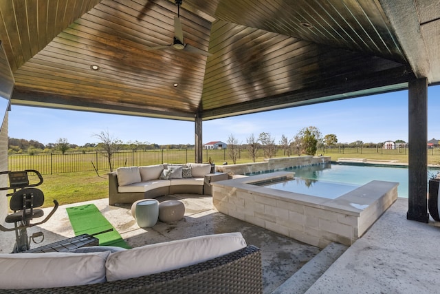 view of patio with a gazebo, a pool with hot tub, and outdoor lounge area