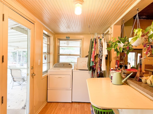 laundry area with plenty of natural light and wood ceiling