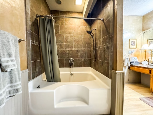 bathroom featuring shower / tub combo with curtain and hardwood / wood-style floors