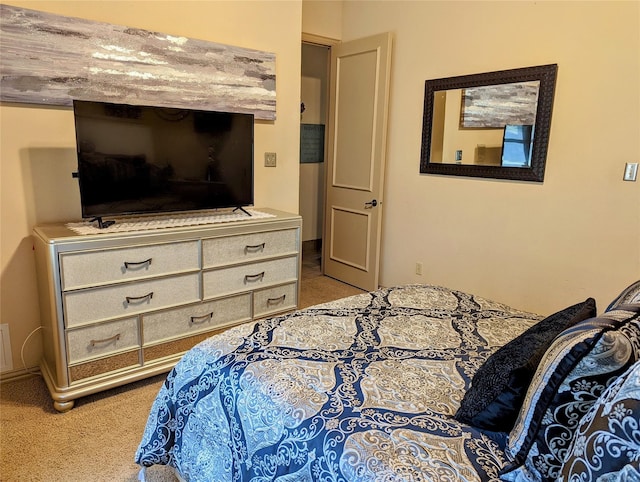 bedroom with light colored carpet