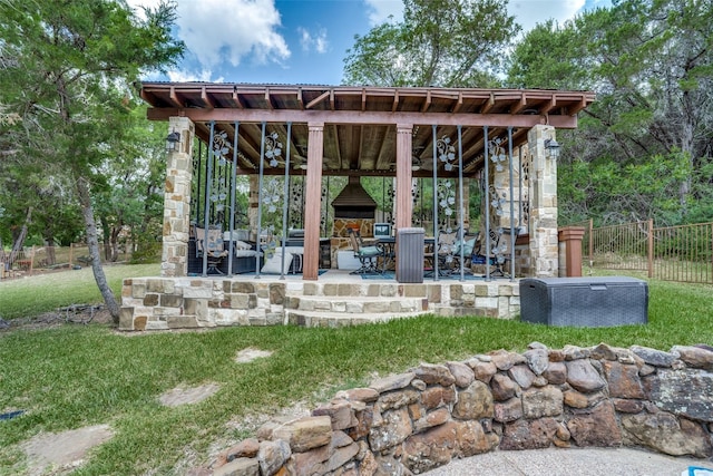 view of home's community with a yard and a patio