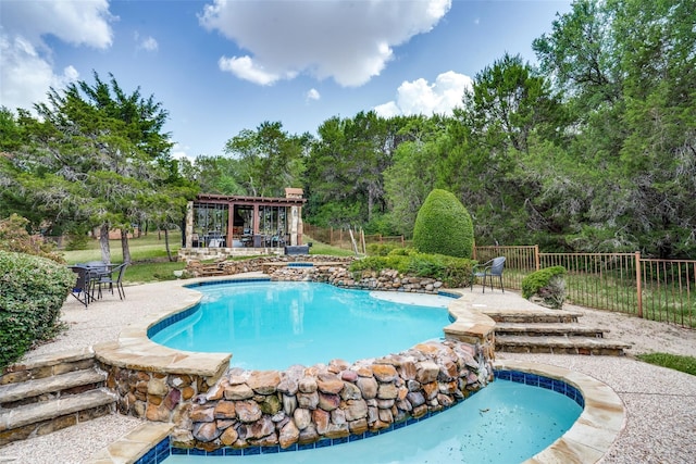 view of pool featuring a patio