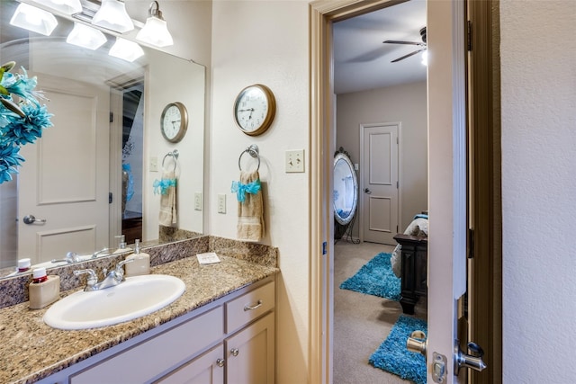 bathroom with vanity and ceiling fan