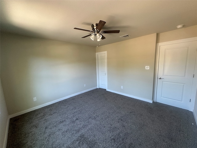 carpeted empty room with ceiling fan