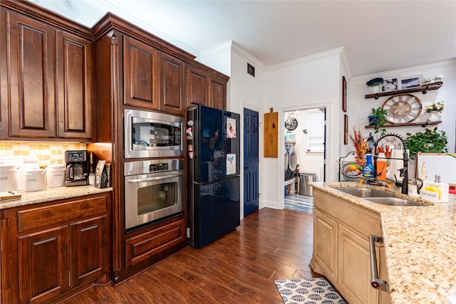 kitchen with backsplash, ornamental molding, stainless steel appliances, dark wood-type flooring, and sink