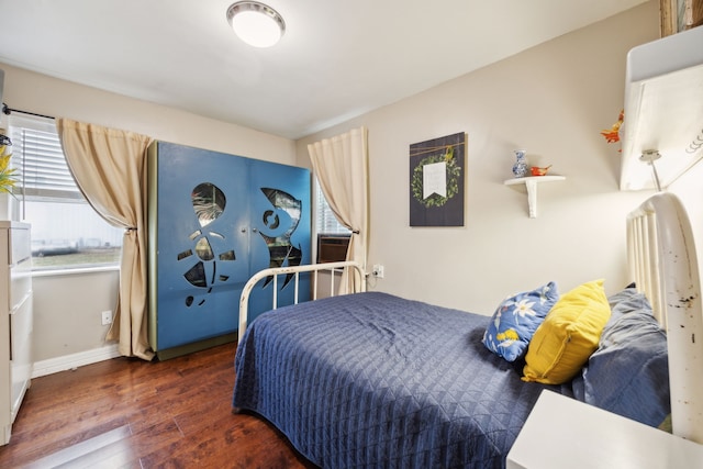 bedroom featuring dark hardwood / wood-style floors