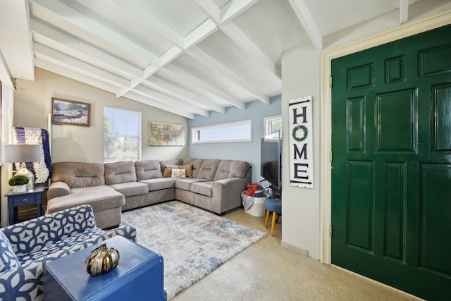 living room featuring vaulted ceiling with beams