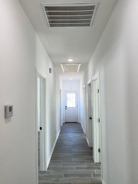 hall featuring dark hardwood / wood-style floors