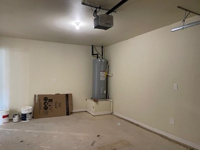 garage with electric water heater and a garage door opener