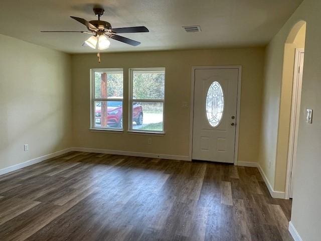 foyer entrance featuring dark hardwood / wood-style floors and ceiling fan