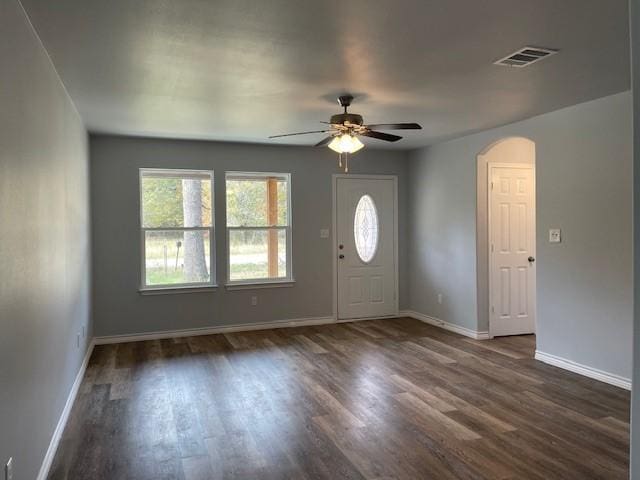 foyer entrance featuring ceiling fan and dark hardwood / wood-style flooring