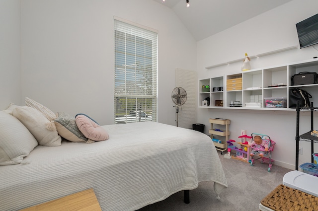 bedroom with carpet and vaulted ceiling