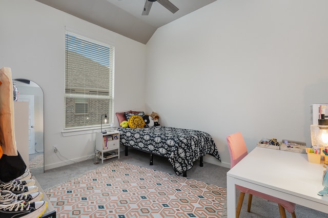 bedroom with ceiling fan, light carpet, and lofted ceiling