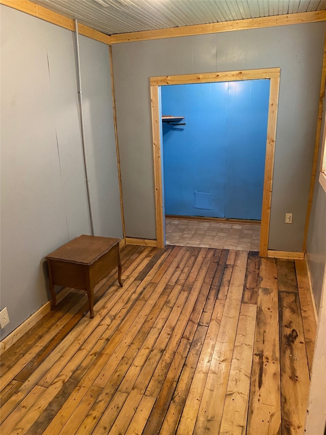 entryway with hardwood / wood-style flooring