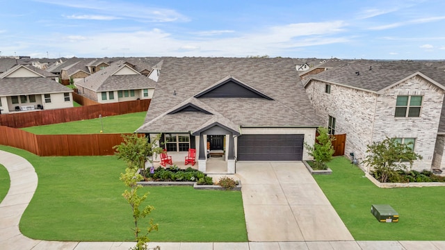 view of front facade with a garage and a front yard