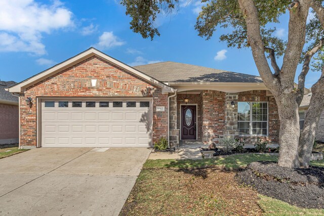 ranch-style house featuring a garage