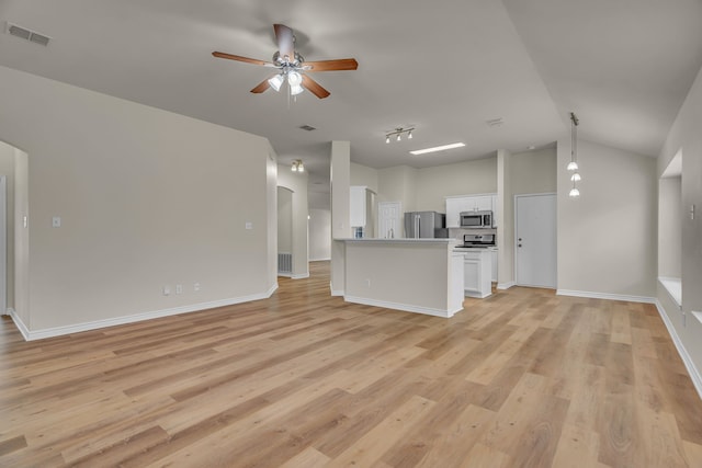 unfurnished living room featuring ceiling fan, lofted ceiling, and light hardwood / wood-style floors