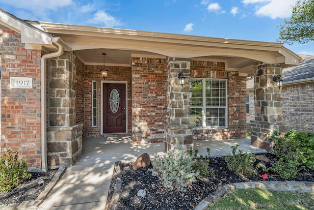 property entrance with covered porch