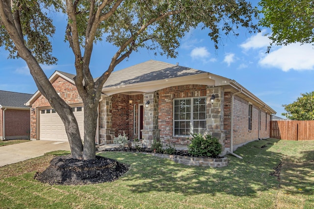 ranch-style home featuring a front lawn and a garage