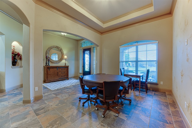 dining space featuring ornamental molding