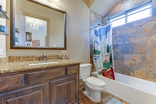 full bathroom featuring lofted ceiling, shower / bath combo with shower curtain, toilet, a notable chandelier, and vanity