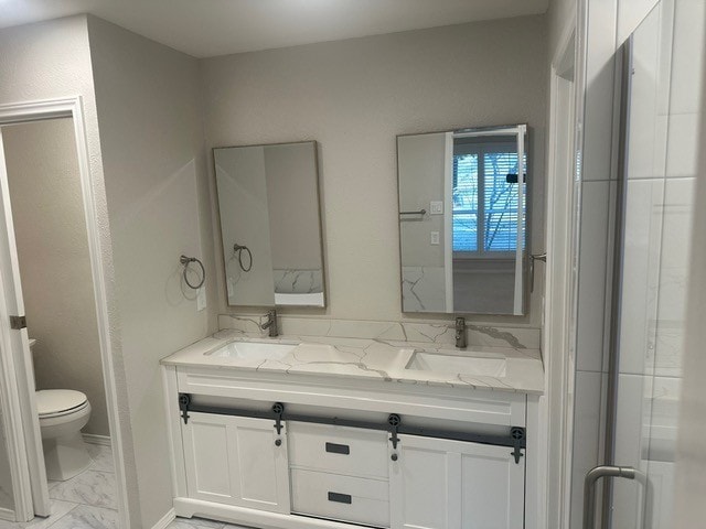 kitchen with appliances with stainless steel finishes, white cabinets, backsplash, and dark stone countertops