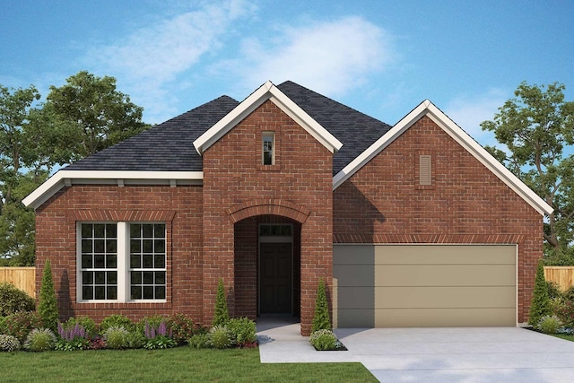 view of front facade with a garage and a front lawn