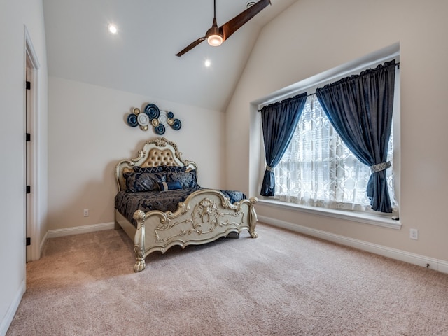 carpeted bedroom with lofted ceiling and ceiling fan