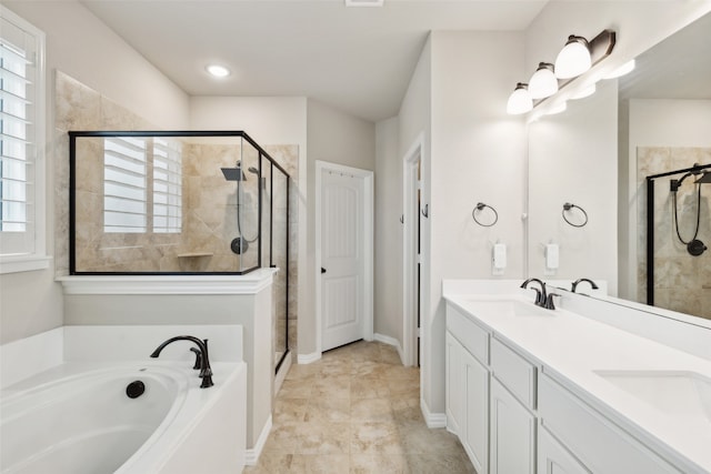 bathroom featuring vanity and plus walk in shower