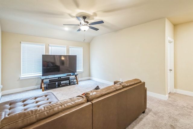 carpeted living room featuring lofted ceiling and ceiling fan