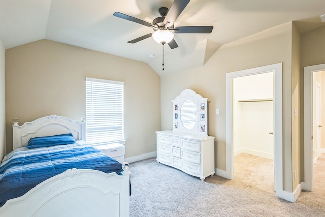 carpeted bedroom featuring lofted ceiling and ceiling fan