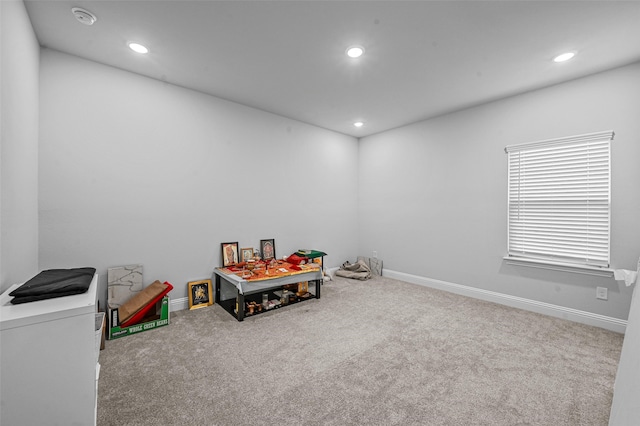 rec room featuring carpet