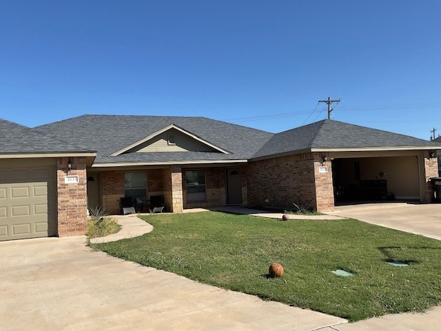 ranch-style home featuring a garage and a front yard