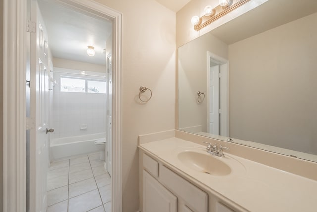 full bathroom featuring tile patterned floors, vanity, toilet, and shower / tub combination