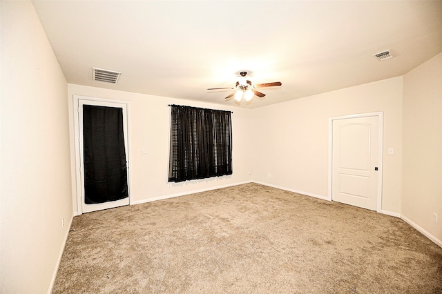 carpeted empty room with ceiling fan