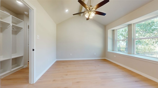 interior space with lofted ceiling, ceiling fan, and light hardwood / wood-style flooring