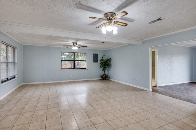 tiled empty room featuring ornamental molding, a textured ceiling, and ceiling fan