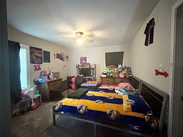 bedroom with ceiling fan and carpet floors