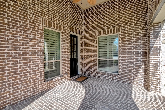 entrance to property with a patio area