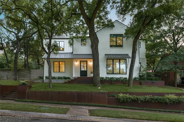 view of front facade with a front yard