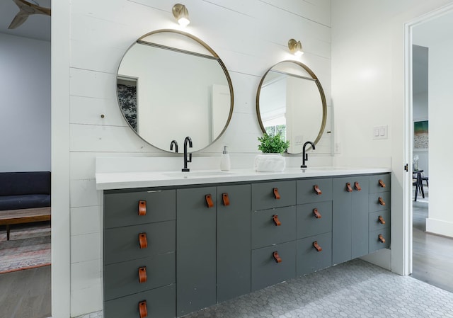 bathroom featuring hardwood / wood-style flooring and vanity