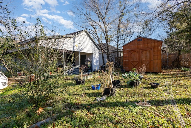 view of yard with a storage shed