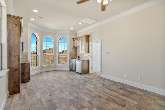 unfurnished living room with ceiling fan, sink, light hardwood / wood-style flooring, and crown molding