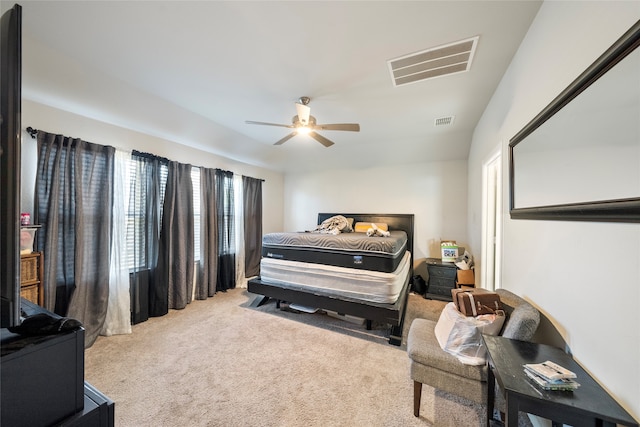 bedroom featuring ceiling fan and light colored carpet