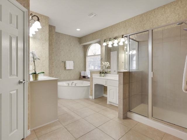 bathroom featuring tile patterned flooring, vanity, and independent shower and bath